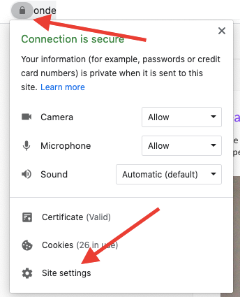 The browser site information panel with an arrow pointing to the Site settings link