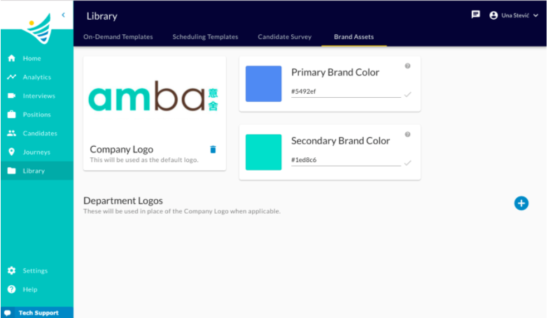 The Library page, Brand Assets tab, showing the company logo, primary and secondary brand colors and department logos