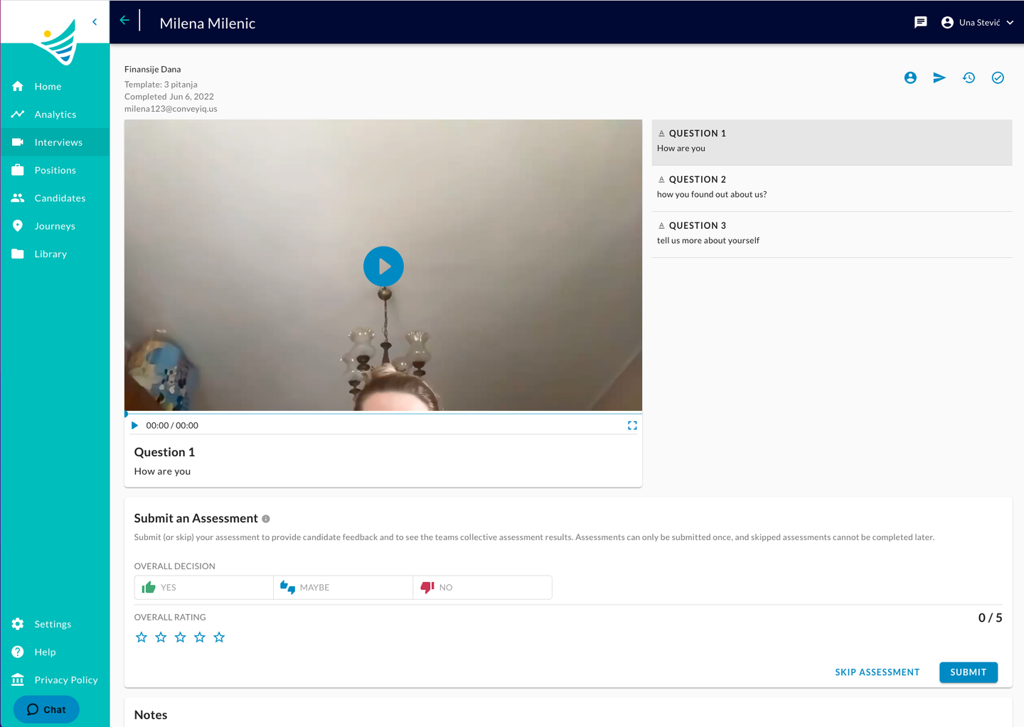 The interview review page with a video player, a question list and the Submit an Assessment form
