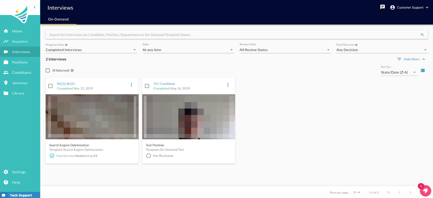 The Interviews page in card view with filters and two completed interviews
