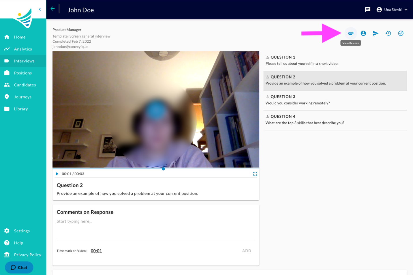An interview review page with an arrow pointing to the View Resume paperclip icon in the top right toolbar