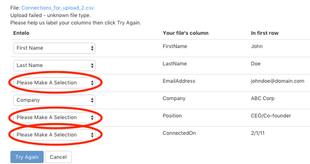 The column mapping screen after a failed upload, with three Please Make A Selection menus circled