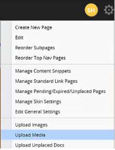 A menu of page actions with Upload Media highlighted